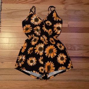 i’m selling a sunflower romper